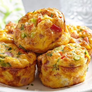 Delicious egg muffins with ham, cheese and vegetables